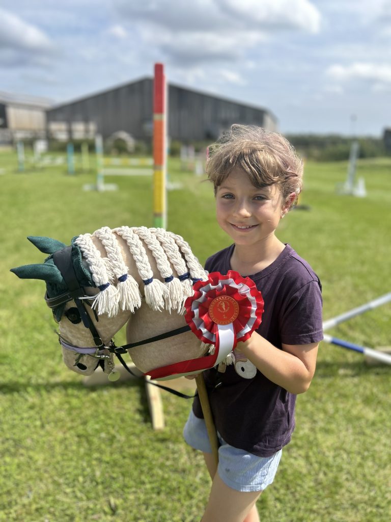 Child with hobby horse